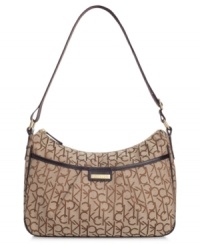 For fashionistas on-the-move, upgrade your style status with this signature jacquard messenger bag from Calvin Klein. Outfitted with the iconic CK monogram and a plethora of pockets, it's totally travel-ready. For fashionistas on-the-move, upgrade your style status with this signature jacquard messenger bag from Calvin Klein. Outfitted with the iconic CK monogram and a plethora of pockets, it's totally travel-ready.