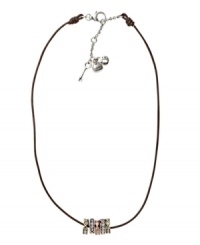Subtle enough to blend with your best outfit, yet stylish enough to make a statement. Fossil's chic necklace features a chocolate leather cord strung with vintage-style silver tone, brass tone, and rose gold tone mixed metal beads accented with crystals. Approximate length: 16 inches + 2-inch extender. Subtle enough to blend with your best outfit, yet stylish enough to make a statement. Fossil's chic necklace features a chocolate leather cord strung with vintage-style silver tone, brass tone, and rose gold tone mixed metal beads accented with crystals. Approximate length: 16 inches + 2-inch extender.