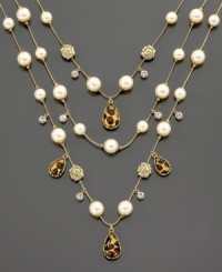 A vintage-inspired look you'll love. Three layers of goldtone metal chain, glass pearls and leopard-print charms with sweet heart borders. Length measures 24 inches. A vintage-inspired look you'll love. Three layers of goldtone metal chain, glass pearls and leopard-print charms with sweet heart borders. Length measures 24 inches.