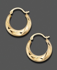 Textured 14k gold makes these hoop earrings oh-so modern. Textured 14k gold makes these hoop earrings oh-so modern.