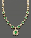 Establish everlasting elegance with this royalty-inspired necklace from Royalty Inspired by Effy Collection. Filled with lovely detail, this necklace features oval and round-cut emeralds (3-3/8 ct. t.w.) and round-cut diamonds (2-1/3 ct. t.w.) set in 14k gold. Approximate length: 16 inches. Approximate drop: 1 inch.