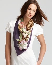 Get set for an uptown safari with this oversized jungle print Salvatore Ferragamo silk scarf, in a bold leopard and palm motif on a violet background. Get set for an uptown safari with this oversized jungle print Salvatore Ferragamo silk scarf, in a bold leopard and palm motif on a violet background.