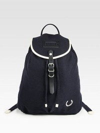 Whether on campus or off, tote your books, and the like, around in style with this vintage-inspired backpack crafted in durable cotton canvas.Flap, buckle closureDrawstring tieTop handleInterior zip pocketCotton14W x 16H x 5DImported