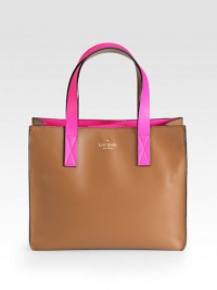 Luxurious leather in two, high-contrast tones; a bold carryall for all your essentials.Double top handles, 6¼ dropMagnetic snap tab closureProtective metal feetOne inside zip pocketTwo inside open pocketsCotton lining12W X 10H X 4½DImported Luxurious leather in two, high-contrast tones; a bold carryall for all your essentials.Double top handles, 6¼ dropMagnetic snap tab closureProtective metal feetOne inside zip pocketTwo inside open pocketsCotton lining12W X 10H X 4½DImported