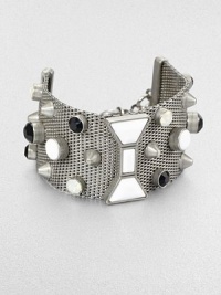 A wide cuff of silvery mesh is dotted with faceted glass stones and studs, plus a bow-shaped centerpiece in front.GlassSilvertone finishLength, about 7Bold spring ring claspImported