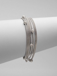 From the Petite Pavé Bead Collection. Eight box-link strands of shining sterling silver, dotted with shimmering pavé diamond beads. Diamonds, 0.49 tcw Sterling silver Length, about 7½ Lobster clasp Imported