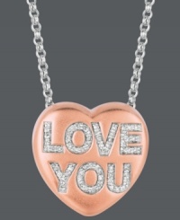 Add a little romance to the moment. Give her the gift of Sweethearts' stunning pendant. Crafted in 14k rose gold over sterling silver, this heart-shaped design features the words LOVE YOU in round-cut diamonds (1/6 ct. t.w.). Copyright © 2011 New England Confectionery Company. Approximate length: 16 inches + 2-inch extender. Approximate drop: 5/8 inch. Add a little romance to the moment. Give her the gift of Sweethearts' stunning pendant. Crafted in 14k rose gold over sterling silver, this heart-shaped design features the words LOVE YOU in round-cut diamonds (1/6 ct. t.w.). Copyright © 2011 New England Confectionery Company. Approximate length: 16 inches + 2-inch extender. Approximate drop: 5/8 inch.