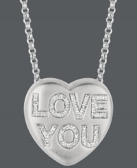 Get in touch with your inner romantic. Give her the gift of Sweethearts' stunning pendant. Crafted in sterling silver, this heart-shaped design features the words LOVE YOU in round-cut diamonds (1/6 ct. t.w.). Copyright © 2011 New England Confectionery Company. Approximate length: 16 inches + 2-inch extender. Approximate drop: 5/8 inch. Get in touch with your inner romantic. Give her the gift of Sweethearts' stunning pendant. Crafted in sterling silver, this heart-shaped design features the words LOVE YOU in round-cut diamonds (1/6 ct. t.w.). Copyright © 2011 New England Confectionery Company. Approximate length: 16 inches + 2-inch extender. Approximate drop: 5/8 inch.