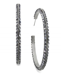 A sparkling take on the classic hoop earring from INC International Concepts. The large silhouette is embellished with glass crystal stones. Crafted in rhodium-plated mixed metal. Approximate diameter: 2-1/2 inches. A sparkling take on the classic hoop earring from INC International Concepts. The large silhouette is embellished with glass crystal stones. Crafted in rhodium-plated mixed metal. Approximate diameter: 2-1/2 inches.