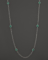 Faceted crystal and malachite are chicly framed by sterling silver Caviar™ beading and fluted oval links. Faceted crystal and malachite are chicly framed by sterling silver Caviar™ beading and fluted oval links.