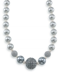 This tinsel-colored necklace will add an extra twinkle to your outfit. Crafted by Carolee, necklace features graduated pewter glass pearls, charcoal glass pearls and sparkling crystal glass fireballs. Set in silvertone mixed metal. Approximate length: 16 inches + 2-inch extender. This tinsel-colored necklace will add an extra twinkle to your outfit. Crafted by Carolee, necklace features graduated pewter glass pearls, charcoal glass pearls and sparkling crystal glass fireballs. Set in silvertone mixed metal. Approximate length: 16 inches + 2-inch extender.