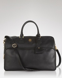 Take Tory Burch's polished style with you when you travel. Crafted from leather, this piece has a well traveled look with a roomy capacity that will allow you to pack everything you need. Take Tory Burch's polished style with you when you travel. Crafted from leather, this piece has a well traveled look with a roomy capacity that will allow you to pack everything you need.