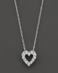 A beautiful diamond heart pendant in 14 Kt. white gold, with rope chain. A beautiful diamond heart pendant in 14 Kt. white gold, with rope chain.