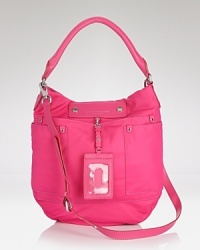 MARC BY MARC JACOBS' leather hobo take its cues from school-yard chic. The durable nylon bag touts essentials (or books,) making it a perfect partner for your day-to-day uniform. MARC BY MARC JACOBS' leather hobo take its cues from school-yard chic. The durable nylon bag touts essentials (or books,) making it a perfect partner for your day-to-day uniform.