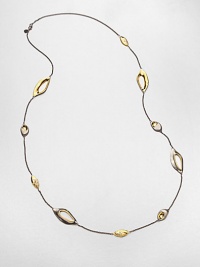From the Miss Havisham Collection. A delicate gunmetal chain is stationed with an array of free-form ovals, some open, some two-tone and some sprinkled with tiny Swarovski crystals.CrystalGoldtone and ruthenium plateLength, about 42Lobster claspMade in USA From the Miss Havisham Collection. A delicate gunmetal chain is stationed with an array of free-form ovals, some open, some two-tone and some sprinkled with tiny Swarovski crystals.CrystalGoldtone and ruthenium plateLength, about 42Lobster claspMade in USA