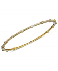 Stack on endless dazzle! This glamorous bangle bracelet from CRISLU is the perfect layering piece with cubic zirconia sparkle (2-1/2 ct. t.w.). Set in 18k gold over sterling silver. Approximate diameter: 2-1/2 inches. Stack on endless dazzle! This glamorous bangle bracelet from CRISLU is the perfect layering piece with cubic zirconia sparkle (2-1/2 ct. t.w.). Set in 18k gold over sterling silver. Approximate diameter: 2-1/2 inches.