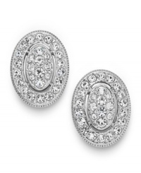 The perfect accent comes in a pretty oval-shaped package. Eliot Danori's Windsor stud earrings feature an intricate design in round-cut crystal. Set in rhodium-plated silver tone mixed metal. Approximate diameter: 1/2 inch. The perfect accent comes in a pretty oval-shaped package. Eliot Danori's Windsor stud earrings feature an intricate design in round-cut crystal. Set in rhodium-plated silver tone mixed metal. Approximate diameter: 1/2 inch.