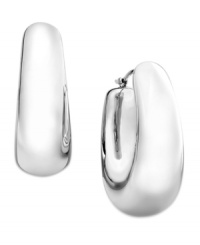 A solid and stylish choice. These medium-sized hoop earrings make a bold statement at any formal affair. Crafted from sterling silver. Approximate drop: 1 inch. Approximate diameter: 1/2 inch.