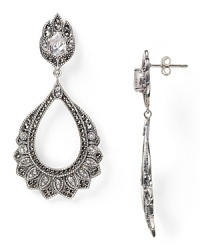Wear this pair of Judith Jack party lights for elegant sparkle, crafted of sterling silver with a delicate cascade of crystal accents. Wear this pair of Judith Jack party lights for elegant sparkle, crafted of sterling silver with a delicate cascade of crystal accents.
