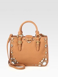 Perfectly sized for all your essentials, this leather design is accented with studs, rhinestones and a sweet bow.Double top handles, 5 dropDetachable shoulder strap, 18¾ dropMagnetic snap strap closureThree inner compartmentsOne inside zip pocketOne inside open pocketSatin lining11W X 8½H X 4½DMade in Italy Perfectly sized for all your essentials, this leather design is accented with studs, rhinestones and a sweet bow.Double top handles, 5 dropDetachable shoulder strap, 18¾ dropMagnetic snap strap closureThree inner compartmentsOne inside zip pocketOne inside open pocketSatin lining11W X 8½H X 4½DMade in Italy