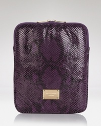 Protect your tablet with MICHAEL Michael Kors' patent python iPad case, complete with gleaming gold-tone logo plaque. Protect your tablet with MICHAEL Michael Kors' patent python iPad case, complete with gleaming gold-tone logo plaque.