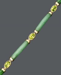 Snap up style in warm-weather hues. This citrus-colored bracelet features a beautiful jade link (5 mm x 27 mm) and oval-cut peridot (1-1/8 ct. t.w.) design set in 14k gold. Approximate length: 7-1/5 inches. Snap up style in warm-weather hues. This citrus-colored bracelet features a beautiful jade link (5 mm x 27 mm) and oval-cut peridot (1-1/8 ct. t.w.) design set in 14k gold. Approximate length: 7-1/5 inches.
