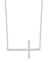A stunning testament. This necklace features a sideways cross with cubic zirconia accents adding a lustrous touch. Crafted from sterling silver. Approximate length: 18 inches. Approximate drop length: 3/4 inch. Approximate drop width: 1-3/8 inches. A stunning testament. This necklace features a sideways cross with cubic zirconia accents adding a lustrous touch. Crafted from sterling silver. Approximate length: 18 inches. Approximate drop length: 3/4 inch. Approximate drop width: 1-3/8 inches.