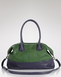 Join the color block party with this leather satchel from DKNY. Luxurious and spacious, this tone on tone style is a must-have companion for busy days in the city. Join the color block party with this leather satchel from DKNY. Luxurious and spacious, this tone on tone style is a must-have companion for busy days in the city.