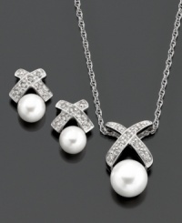 Radiant cultured freshwater pearls (6-8 mm) are hugged by sparkling sterling silver settings dotted with diamond accents on this beautiful pendant and earrings set. Pendant measures approximately 18 inches with a 5/8-inch drop. Earrings measure approximately 1/4 inch. Radiant cultured freshwater pearls (6-8 mm) are hugged by sparkling sterling silver settings dotted with diamond accents on this beautiful pendant and earrings set. Pendant measures approximately 18 inches with a 5/8-inch drop. Earrings measure approximately 1/4 inch.