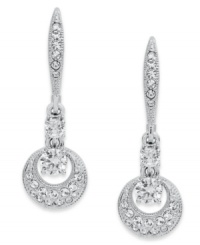 Don't drop the dazzle! Eliot Danori's elegant earrings feature intricate crystal accents and cubic zirconia (3/4 ct. t.w.) on circle drops. Set in rhodium-plated silver tone mixed metal. Approximate drop: 3/4 inch. Don't drop the dazzle! Eliot Danori's elegant earrings feature intricate crystal accents and cubic zirconia (3/4 ct. t.w.) on circle drops. Set in rhodium-plated silver tone mixed metal. Approximate drop: 3/4 inch.