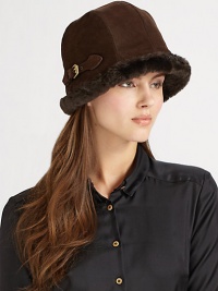 Sporty bucket shape with warm faux shearling trim is accented with golden buckle detail. Water-repellent One size fits most Italian calf suede Fully lined Dry clean by leather specialists Made in USA Sporty bucket shape with warm faux shearling trim is accented with golden buckle detail. Water-repellent One size fits most Italian calf suede Fully lined Dry clean by leather specialists Made in USA