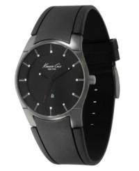 Smooth and slim, this classic Kenneth Cole New York watch is a versatile favorite. Black polyurethane strap and round gunmetal stainless steel case. Matte black dial with gunmetal-toned stick indices, logo and date window. Analog movement. Water resistant to 30 meters. Limited lifetime warranty. Smooth and slim, this classic Kenneth Cole New York watch is a versatile favorite. Black polyurethane strap and round gunmetal stainless steel case. Matte black dial with gunmetal-toned stick indices, logo and date window. Analog movement. Water resistant to 30 meters. Limited lifetime warranty.