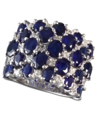 A true blue beauty! EFFY Collection's bold and beautiful cocktail ring highlights dozens of oval-cut sapphires (7-1/6 ct. t.w.) and sparkling round-cut diamonds (5/8 ct. t.w.). Band set in 14k white gold. Approximate width: 7/8 inch.