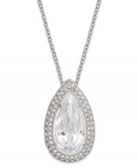 Sophistication reigns with this pave-framed pendant necklace from Eliot Danori. Crafted from rhodium-plated brass, a clear cubic zirconia (5 ct. t.w.) makes a bold statement. Approximate length: 16 inches + 2-inch extender. Approximate drop: 7/8 inch. Sophistication reigns with this pave-framed pendant necklace from Eliot Danori. Crafted from rhodium-plated brass, a clear cubic zirconia (5 ct. t.w.) makes a bold statement. Approximate length: 16 inches + 2-inch extender. Approximate drop: 7/8 inch.