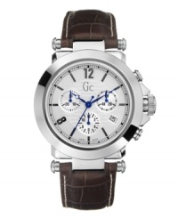 Tough enough for the outdoors, sleek enough for the office. This handsome watch by Gc Swiss Made Timepieces has everything you need, and then some. Brown leather croc-embossed strap and round stainless steel case. Textured silvertone dial features numerals at twelve and eight o'clock, stick indices, date window at four o'clock, three chronograph subdials, vibrant blue hands and logo. Swiss movement. Water resistant to 100 meters. Ten-year limited warranty. Luxury Gc gift box packaging included. Tough enough for the outdoors, sleek enough for the office. This handsome watch by Gc Swiss Made Timepieces has everything you need, and then some. Brown leather croc-embossed strap and round stainless steel case. Textured silvertone dial features numerals at twelve and eight o'clock, stick indices, date window at four o'clock, three chronograph subdials, vibrant blue hands and logo. Swiss movement. Water resistant to 100 meters. Ten-year limited warranty. Luxury Gc gift box packaging included.