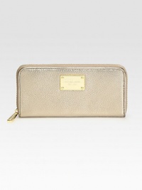Stay organized with this sleek continental design, crafted from metallic pebble-grain leather.Zip-around closure Center zip compartment Two bill compartments Four credit card slots Logo-print lining 8W X 4H X 1/2D Imported Stay organized with this sleek continental design, crafted from metallic pebble-grain leather.Zip-around closure Center zip compartment Two bill compartments Four credit card slots Logo-print lining 8W X 4H X 1/2D Imported