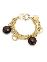 THE LOOKA graceful double chain with textured linksFaceted smoky quartz beads alternate with flat, polished open discsOversized spring ring claspTHE FITLength, about 7½THE MATERIALSmoky quartz18k gold platingORIGINMade in Italy THE LOOKA graceful double chain with textured linksFaceted smoky quartz beads alternate with flat, polished open discsOversized spring ring claspTHE FITLength, about 7½THE MATERIALSmoky quartz18k gold platingORIGINMade in Italy