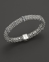 A luxurious rope bracelet from Lagos, crafted from polished silver beads, with sterling silver station breaks.