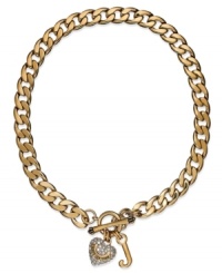 Gilded glamour, by Juicy Couture. This chunky collar necklace glistens with crystal accents and heart/logo charms. Chain crafted in gold tone stainless steel. Charms crafted in gold tone brass with toggle clasp. Approximate length: 16 inches. Approximate drop: 1-1/2 inches. Gilded glamour, by Juicy Couture. This chunky collar necklace glistens with crystal accents and heart/logo charms. Chain crafted in gold tone stainless steel. Charms crafted in gold tone brass with toggle clasp. Approximate length: 16 inches. Approximate drop: 1-1/2 inches.