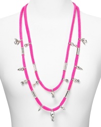Edgy and bright. This ultra-electric style from nOir features a layered cord and tiered beads, the latter cast in striking silver plate. Edgy and bright. This ultra-electric style from nOir features a layered cord and tiered beads, the latter cast in striking silver plate.