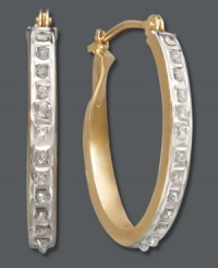 Fit for a diva. These oval-shaped hoops get a touch of extra glam with the addition of sparkling diamond accents. Crafted in 14k gold. Approximate diameter: 3/4 inch x 1/2 inch. Fit for a diva. These oval-shaped hoops get a touch of extra glam with the addition of sparkling diamond accents. Crafted in 14k gold. Approximate diameter: 3/4 inch x 1/2 inch.