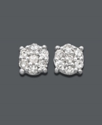 A modern twist on the traditional diamond earring. Seven, round-cut diamonds (1/10 ct. t.w.) cluster together to look like one in these stunning stud earrings. Crafted in 14k white gold. Approximate diameter: 4 mm. A modern twist on the traditional diamond earring. Seven, round-cut diamonds (1/10 ct. t.w.) cluster together to look like one in these stunning stud earrings. Crafted in 14k white gold. Approximate diameter: 4 mm.