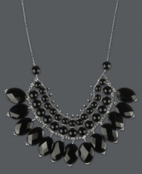 Create a standout statement in bold black hues. Rows of round and oval-cut onyx (172-3/4 ct. t.w.) create a fringe effect within a delicate sterling silver setting. Approximate length: 17 inches. Approximate drop: 1-1/2 inches. Create a standout statement in bold black hues. Rows of round and oval-cut onyx (172-3/4 ct. t.w.) create a fringe effect within a delicate sterling silver setting. Approximate length: 17 inches. Approximate drop: 1-1/2 inches.