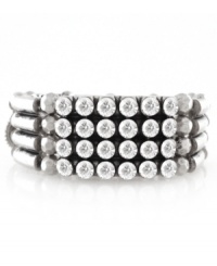 A touch of glass. Sparkling accents add a glam touch to Jessica Simpson's four-row stretch bracelet. Crafted in oxidized silver tone mixed metal. Approximate length: 7-1/2 inches. A touch of glass. Sparkling accents add a glam touch to Jessica Simpson's four-row stretch bracelet. Crafted in oxidized silver tone mixed metal. Approximate length: 7-1/2 inches.