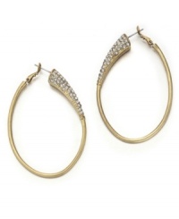 Classic gold hoops with a crystal twist. These glamorous earrings by Jessica Simpson feature clear crystal accents set in worn gold tone mixed metal. Approximate drop: 2-1/2 inches. Classic gold hoops with a crystal twist. These glamorous earrings by Jessica Simpson feature clear crystal accents set in worn gold tone mixed metal. Approximate drop: 2-1/2 inches.