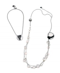 Two elegant looks combine into one chic style. Breil's versatile necklace can be worn as a single heart pendant, or as a long necklace accented by shimmering Mother of Pearl charms. Crafted in polished stainless steel. Approximate length: 14 inches + 4-inch extender. Approximate drop: 1-1/10 inches. Two elegant looks combine into one chic style. Breil's versatile necklace can be worn as a single heart pendant, or as a long necklace accented by shimmering Mother of Pearl charms. Crafted in polished stainless steel. Approximate length: 14 inches + 4-inch extender. Approximate drop: 1-1/10 inches.