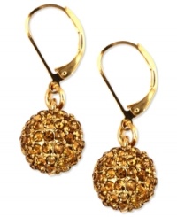 Fashion on fire. Anne Klein's alluring drop earrings highlight fireball accents with topaz crystals for sizzling style. Finished with a leverback closure. Crafted in gold tone mixed metal. Approximate drop: 1 inch. Fashion on fire. Anne Klein's alluring drop earrings highlight fireball accents with topaz crystals for sizzling style. Finished with a leverback closure. Crafted in gold tone mixed metal. Approximate drop: 1 inch.