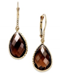 Take your look to the next level with the right amount of color. Pear-cut smokey topaz (10 ct. t.w.) adds the sparkle to these shining 14k gold earrings with diamond accents. Approximate drop: 1-1/4 inches. Take your look to the next level with the right amount of color. Pear-cut smokey topaz (10 ct. t.w.) adds the sparkle to these shining 14k gold earrings with diamond accents. Approximate drop: 1-1/4 inches.
