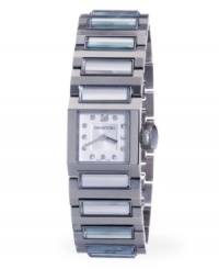 A reflection of you. Clear crystals sparkle on this elegant Dresstime watch by Swarovski. Stainless steel bracelet with 12 crystals and square case. Silver tone sunray dial features crystal accents at markers, logo at twelve o'clock and two silver tone hands. Swiss quartz movement. Water resistant to 30 meters. Two-year limited warranty. A reflection of you. Clear crystals sparkle on this elegant Dresstime watch by Swarovski. Stainless steel bracelet with 12 crystals and square case. Silver tone sunray dial features crystal accents at markers, logo at twelve o'clock and two silver tone hands. Swiss quartz movement. Water resistant to 30 meters. Two-year limited warranty.