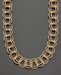 Add zest to any look with this fabulous textured round-link goldtone metal necklace. Length measures 38 inches.